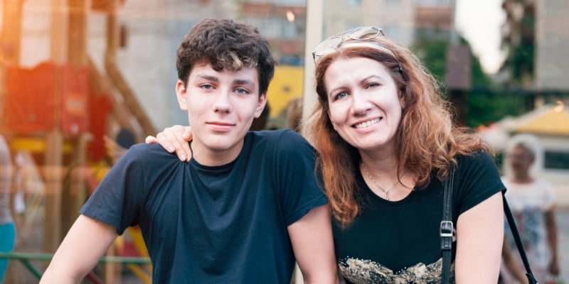 Mental Health Services A mother sits with her teen son